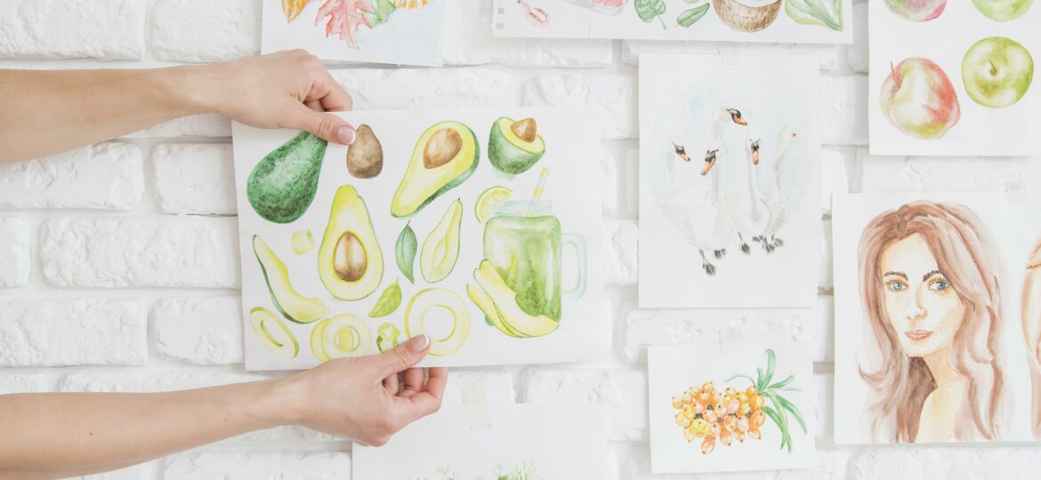 hands-putting-fruit-drawing-on-wall